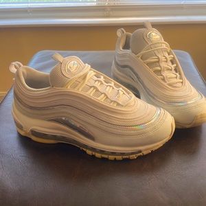 Size 7.5 womens iridescent accent all white Nike, only worn a few times